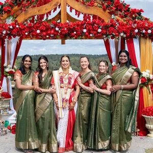 Elegant Red, Green, And Gold Saree